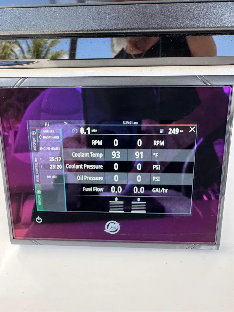 Slide: The Image of 2023 Sea Fox 328 Commander dashboard display showing engine metrics and performance data. - 14