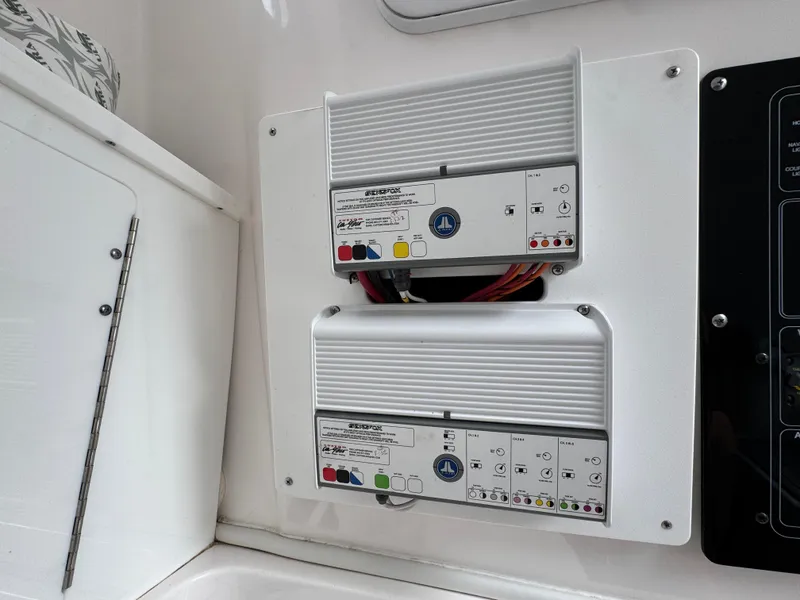 Slide: The Image of Electrical panel on 2023 Sea Fox 328 Commander boat, featuring dual control units. - 39