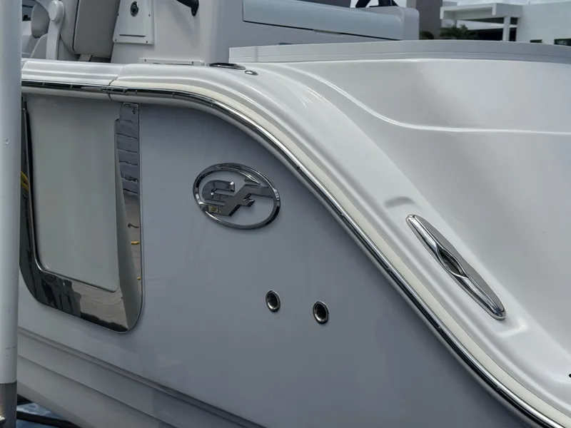 Slide: The Image of 2023 Sea Fox 328 Commander boat detail with logo and sleek design. - 5
