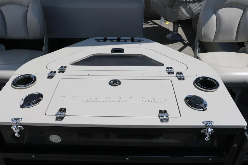 Slide: The Image of 2019 Berkshire 211RFC CTS boat interior with seating and storage compartments. - 19