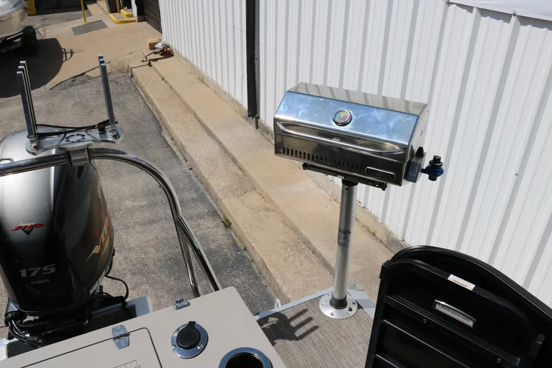 Slide: The Image of Outdoor grill setup on a 2019 Berkshire 211RFC CTS boat deck. - 34