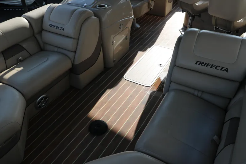 Slide: The Image of Luxurious interior of 2018 Trifecta 23 RFE pontoon boat with plush seating. - 20