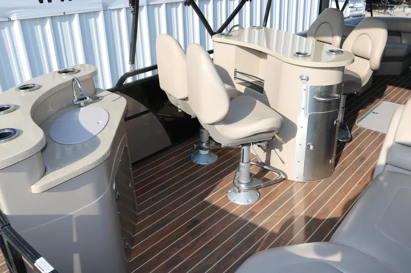 Slide: The Image of Interior of 2018 Trifecta 23 RFE boat with seating and bar area. - 24