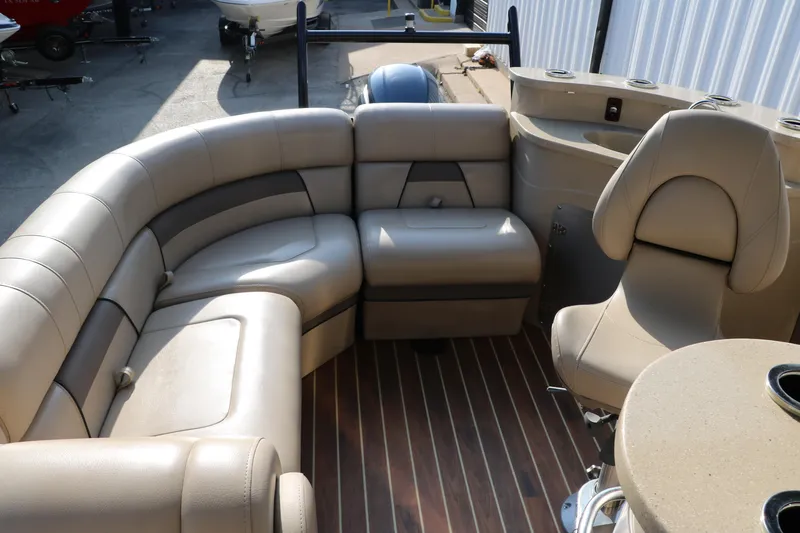 Slide: The Image of Luxurious seating area on 2018 Trifecta 23 RFE boat with beige upholstery. - 32