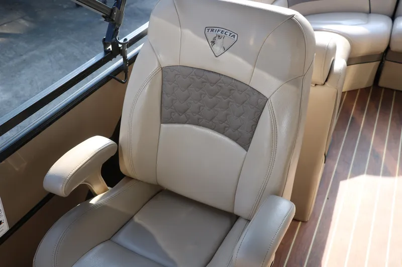 Slide: The Image of Luxurious seating in 2018 Trifecta 23 RFE boat with elegant design and comfortable upholstery. - 34