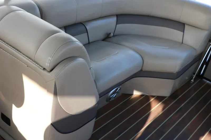 Slide: The Image of Luxurious seating on 2018 Trifecta 23 RFE boat with elegant upholstery and wood flooring. - 41