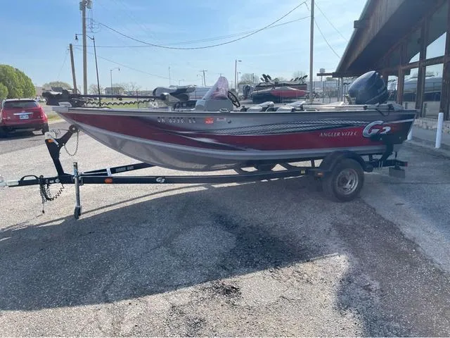 Slide: The Image of 2015 G3 V172C Angler V172C fishing boat on trailer in parking lot. - 2