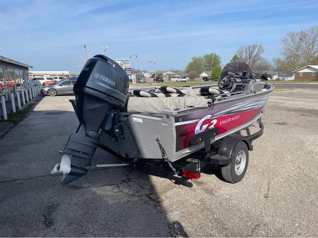Slide: The Image of 2015 G3 V172C boat with Yamaha motor, parked outdoors on a trailer. - 3