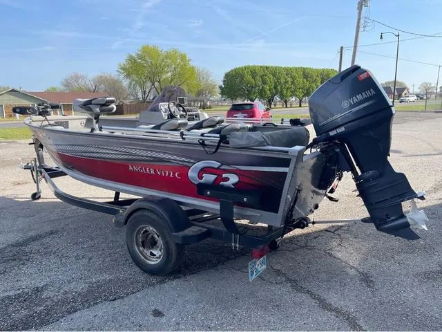 Slide: The Image of 2015 G3 Angler V172C boat with Yamaha motor on trailer, parked outdoors. - 4