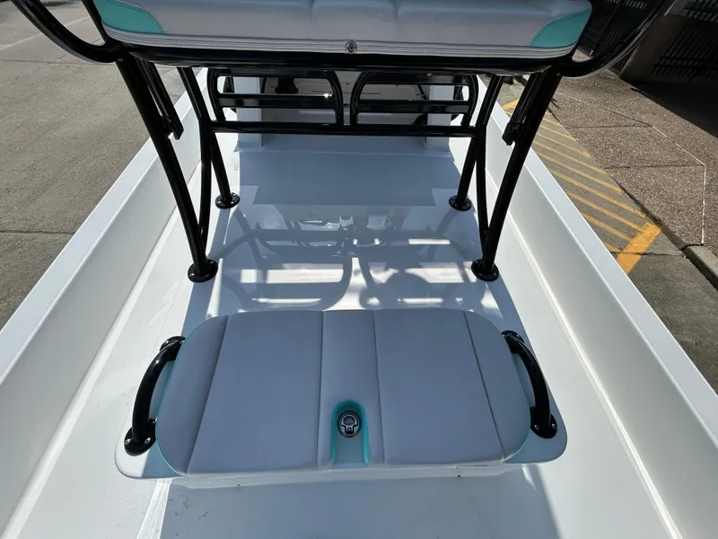 Slide: The Image of 2025 Shallow Sport 22 Sport boat interior with seating and sturdy frame. - 13