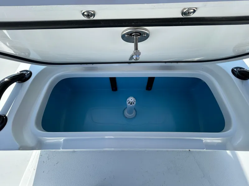 Slide: The Image of Livewell compartment in 2025 Shallow Sport 22 Sport boat, open lid view. - 14