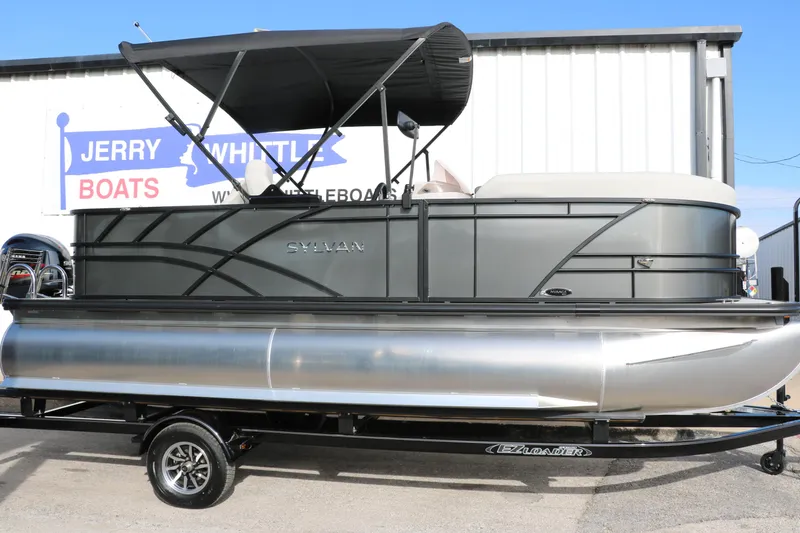 Slide: The Image of 2025 Sylvan Mirage 820 Party Fish Premium Pontoon at dealership, side view. - 11