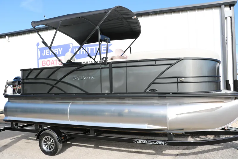 Slide: The Image of 2025 Sylvan Mirage 820 Party Fish Premium Pontoon with canopy on trailer. - 16