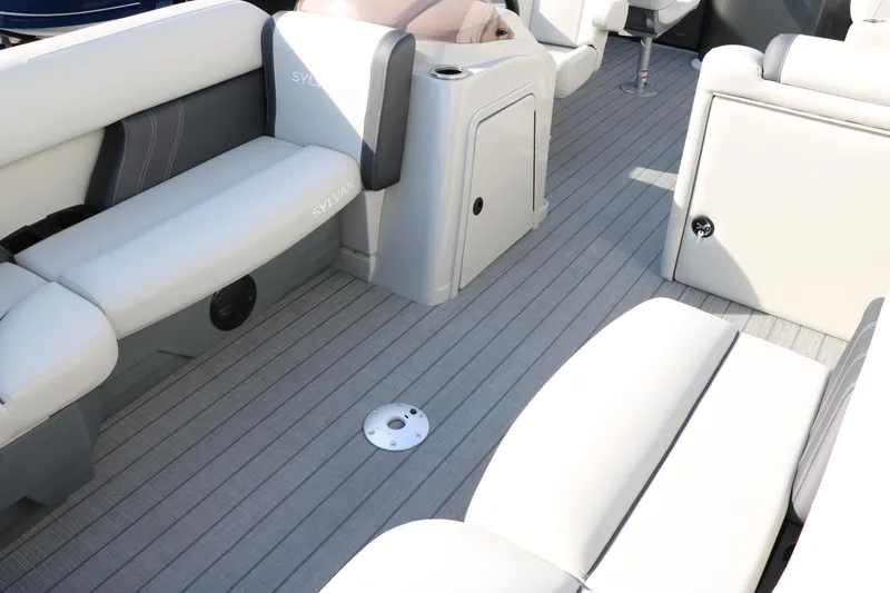 Slide: The Image of 2025 Sylvan Mirage 820 Party Fish Premium Pontoon interior with sleek seating and modern design. - 18