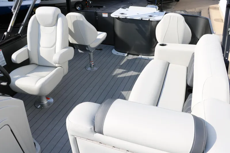 Slide: The Image of 2025 Sylvan Mirage 820 Party Fish Premium Pontoon interior with plush seating and modern design. - 20