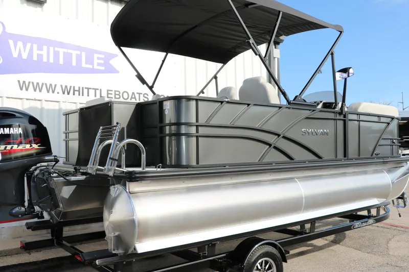 Slide: The Image of 2025 Sylvan Mirage 820 Party Fish Premium Pontoon on trailer, displayed at Whittle Boats. - 3