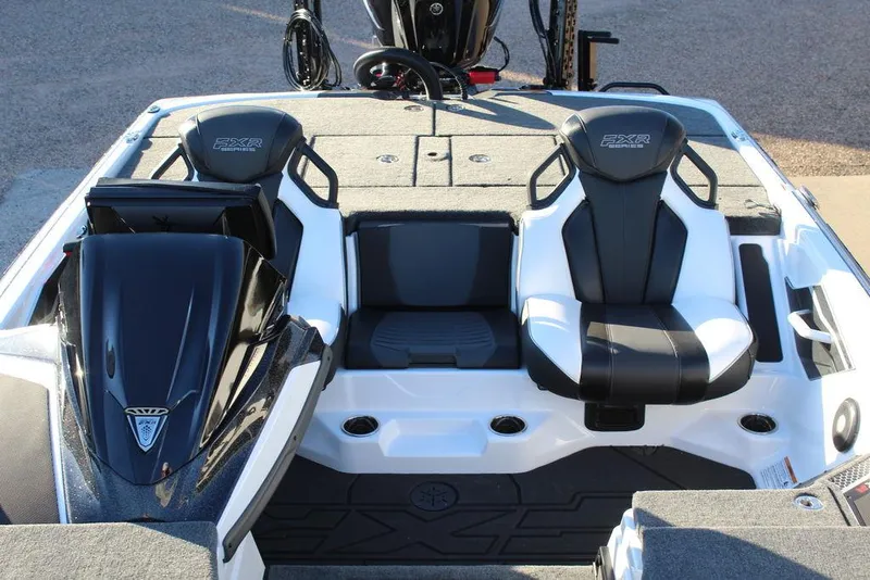 Slide: The Image of 2025 Skeeter FXR20L boat interior with dual seats and sleek design. - 12