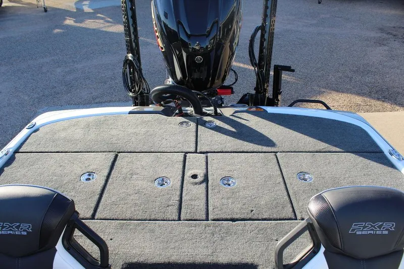 Slide: The Image of 2025 Skeeter FXR20L boat deck with storage compartments and FXR Series seats. - 17