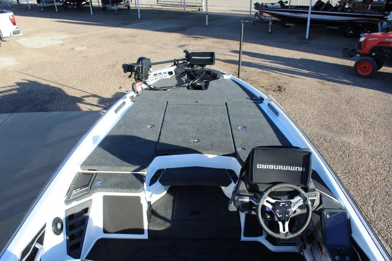 Slide: The Image of 2025 Skeeter FXR20L boat interior with advanced navigation system and spacious deck. - 18