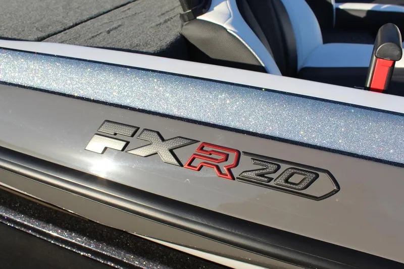 Slide: The Image of 2025 Skeeter FXR20L boat logo on sleek metallic surface. - 22