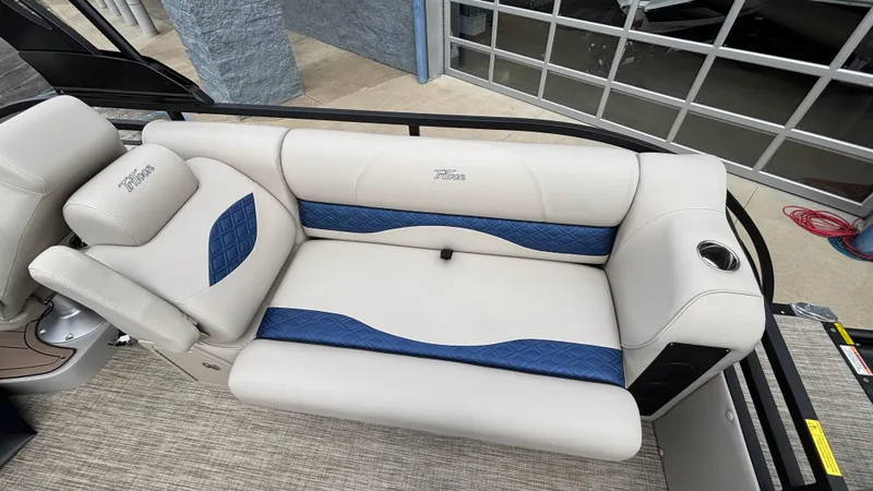 Slide: The Image of 2025 JC Neptoon 25TT Sport boat seat with blue accents and cup holder. - 11