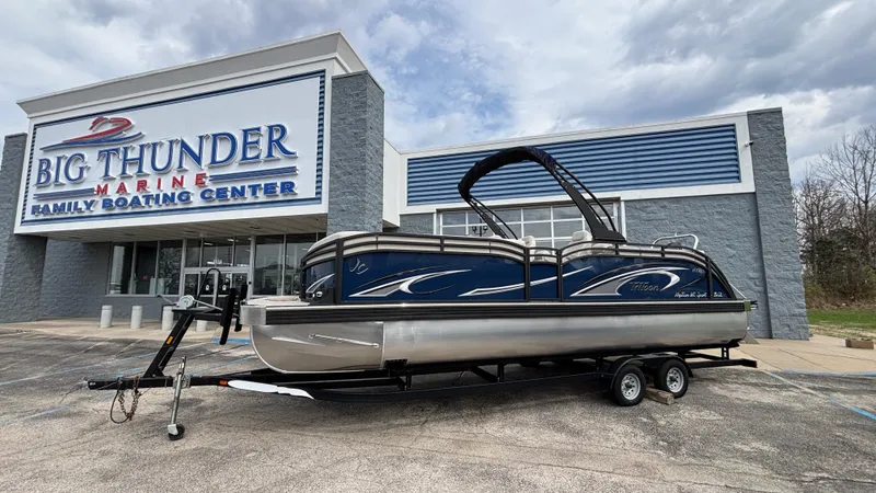 Slide: The Image of 2025 JC Neptoon 25TT Sport pontoon boat at Big Thunder Marine dealership. - 2