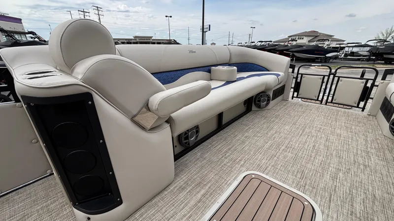 Slide: The Image of 2025 JC Neptoon 25TT Sport pontoon boat interior with plush seating and modern design. - 33