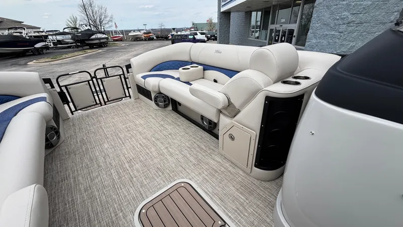 Slide: The Image of 2025 JC Neptoon 25TT Sport pontoon boat interior with plush seating and modern design. - 34