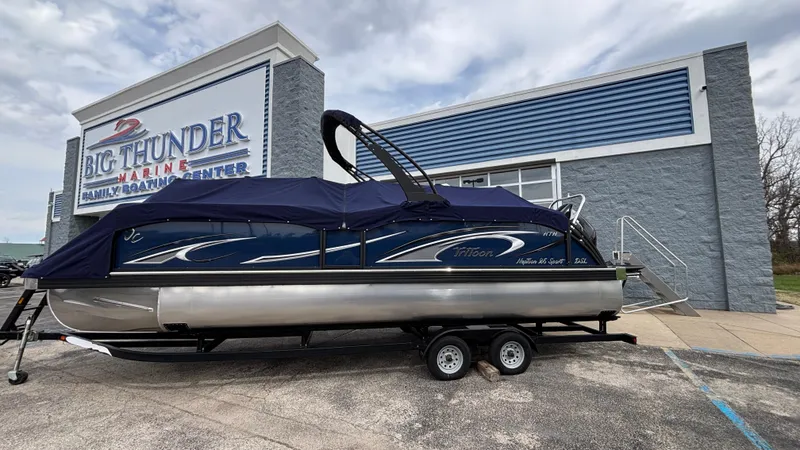 Slide: The Image of 2025 JC Neptoon 25TT Sport pontoon boat on trailer at Big Thunder Marine Center. - 9