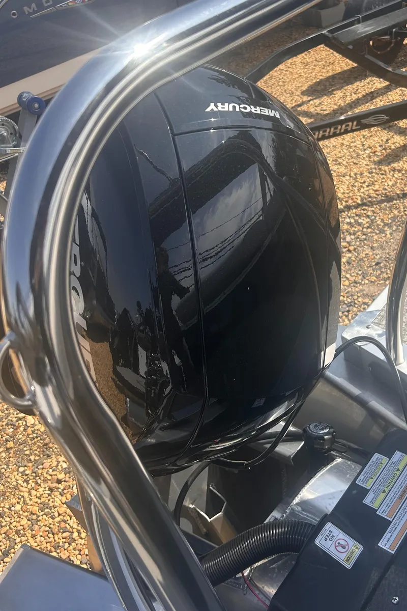 Slide: The Image of 2025 Avalon 2385 LSZ with Mercury outboard motor, close-up view. - 12