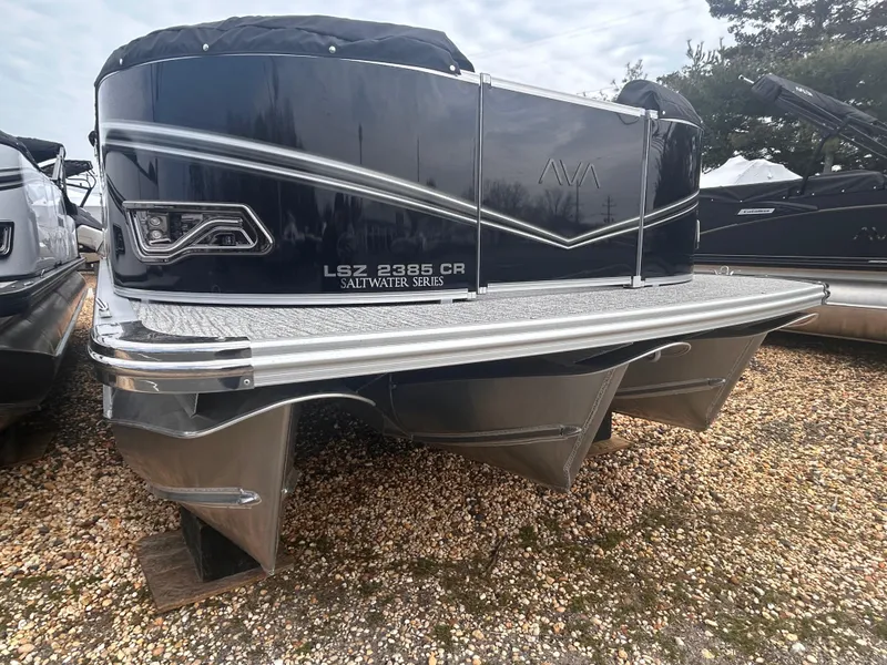 Slide: The Image of 2025 Avalon 2385 LSZ pontoon boat, Saltwater Series, displayed on gravel. - 3