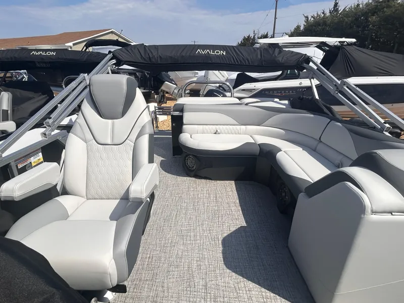 Slide: The Image of 2025 Avalon 2385 LSZ pontoon boat with luxurious seating and modern design. - 4