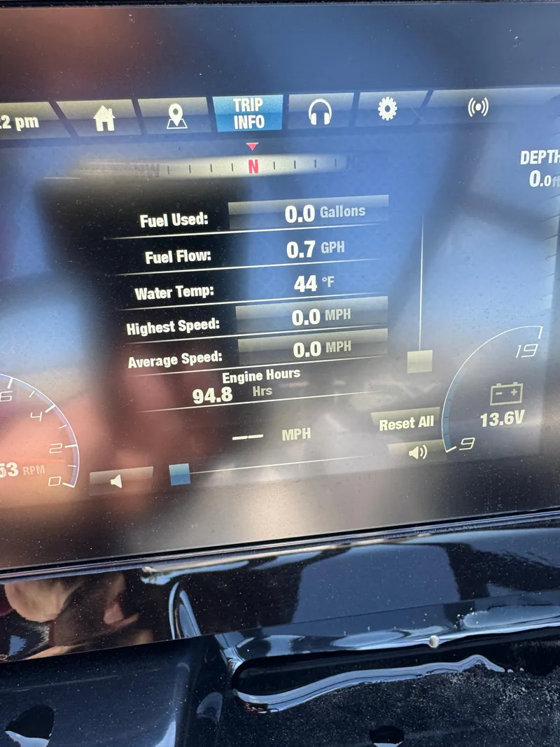 Slide: The Image of Dashboard display of 2022 Yamaha Boats 195S showing trip info and engine statistics. - 4