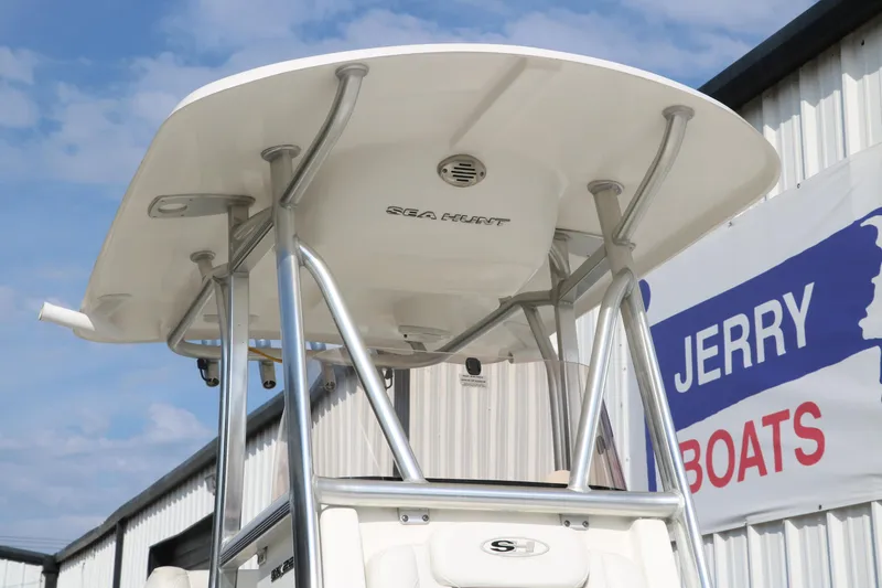 Slide: The Image of 2017 Sea Hunt BX22BR boat with T-top, displayed at Jerry's Boats dealership. - 10