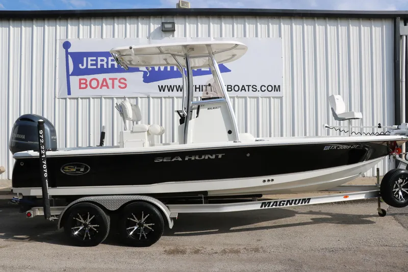Slide: The Image of 2017 Sea Hunt BX22BR boat on trailer, parked outside dealership. - 14