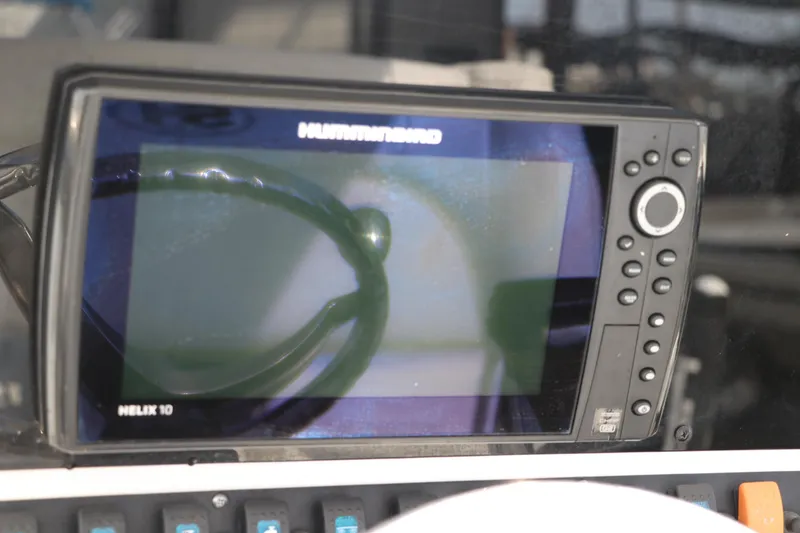 Slide: The Image of Fishfinder display on a 2017 Sea Hunt BX22BR boat dashboard. - 30