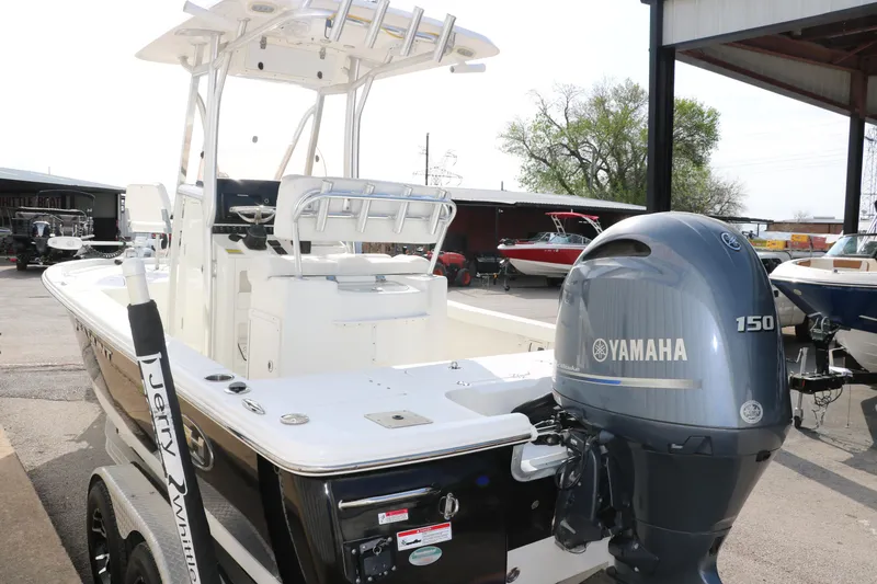 Slide: The Image of 2017 Sea Hunt BX22BR boat with Yamaha 150 engine, parked on a trailer. - 6