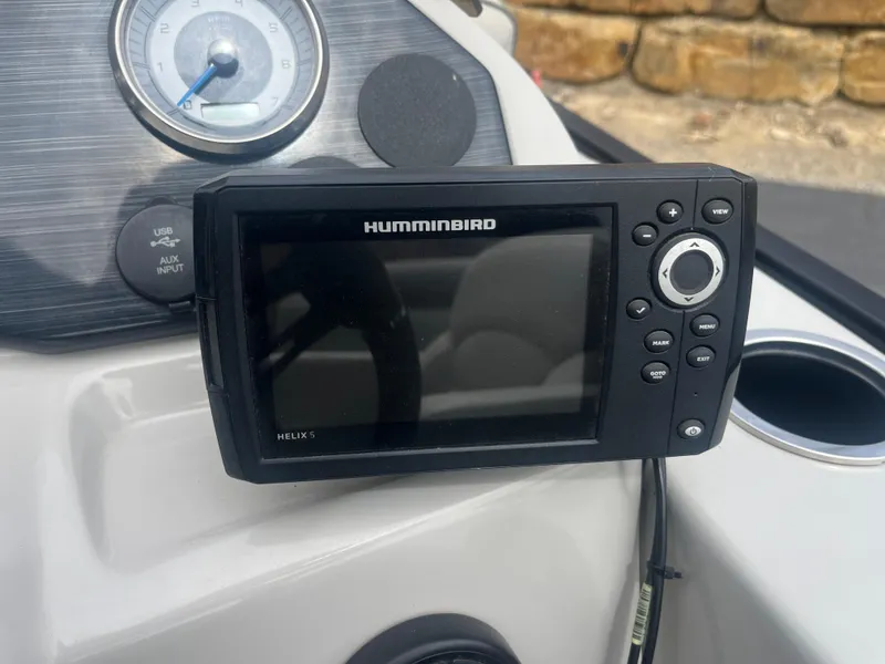 Slide: The Image of Humminbird Helix 5 fish finder on 2019 Starcraft EXS 3 boat dashboard. - 9