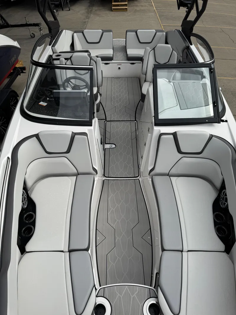 Slide: The Image of 2024 Yamaha Boats 252XE interior with sleek gray seating and modern design. - 5