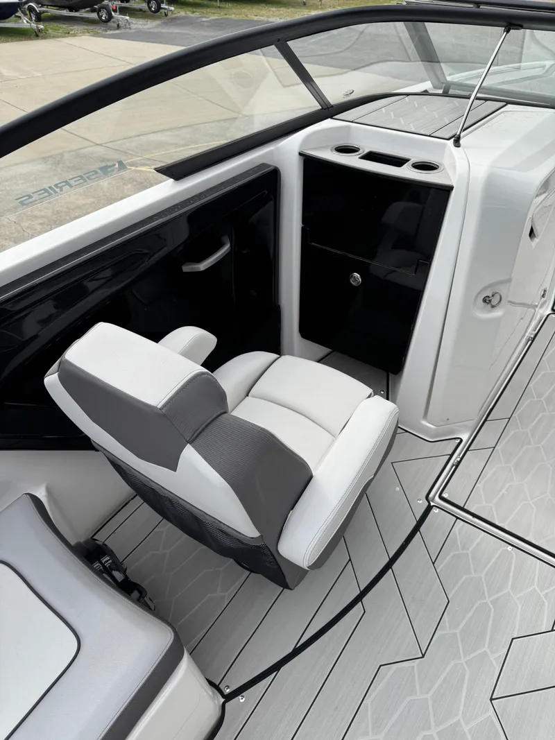 Slide: The Image of 2024 Yamaha Boats 252XE interior with sleek seating and modern design. - 7