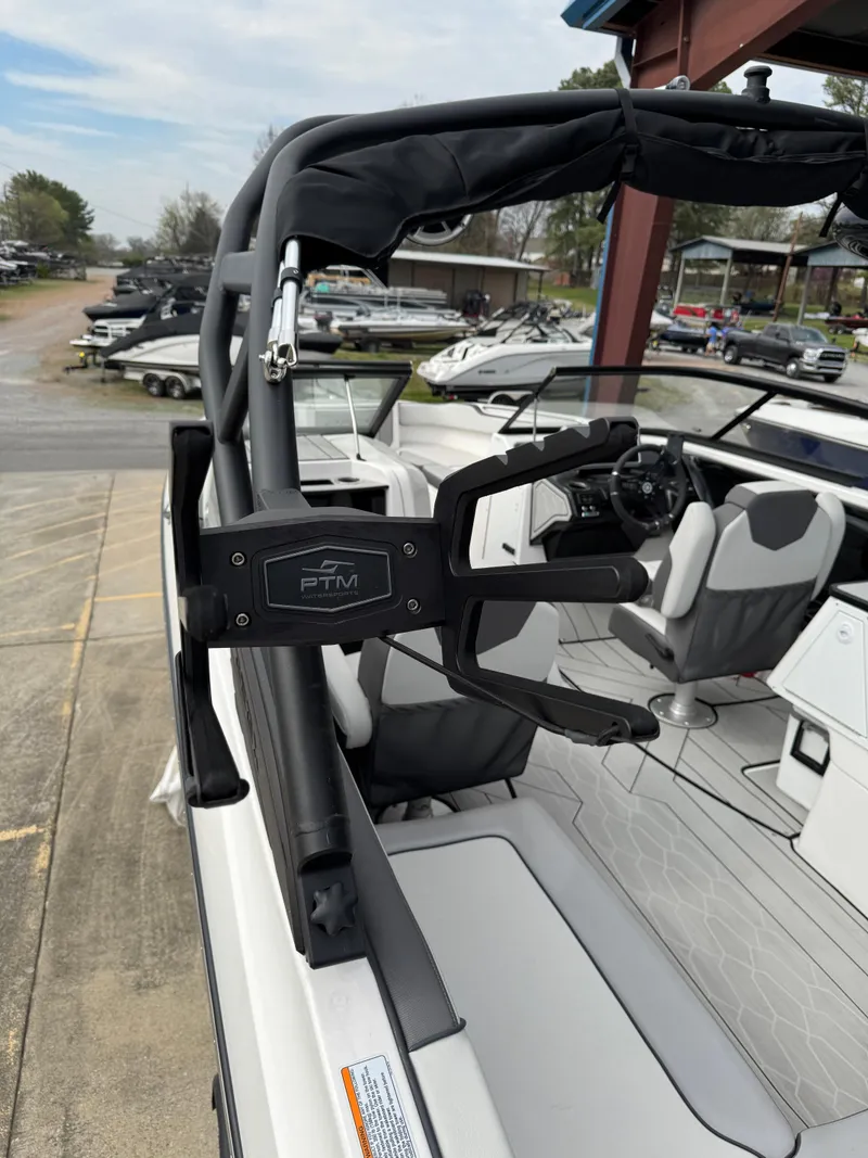 Slide: The Image of 2024 Yamaha Boats 252XE interior with sleek seating and advanced features. - 9