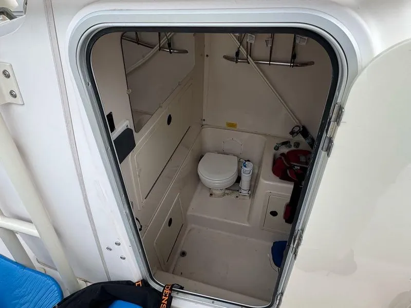 Slide: The Image of Interior view of a 2000 Grady-White Bimini 306 boat bathroom. - 20