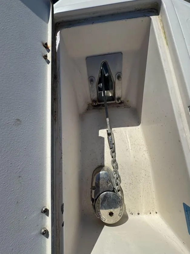 Slide: The Image of Anchor chain compartment of 2000 Grady-White Bimini 306 boat. - 27