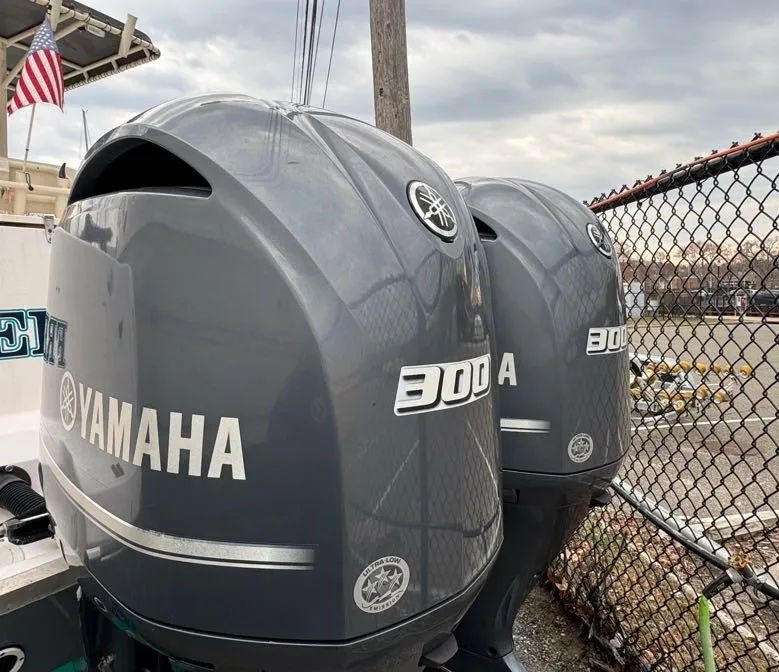 Slide: The Image of Twin Yamaha 300 outboard engines on a 2000 Grady-White Bimini 306 boat. - 9