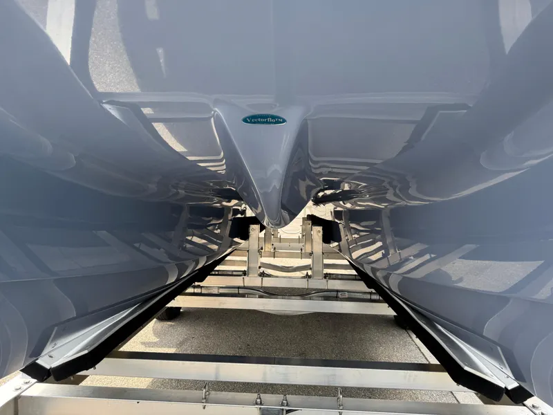 Slide: The Image of 2022 World Cat 230 SD catamaran hull on trailer, showcasing sleek design and craftsmanship. - 10