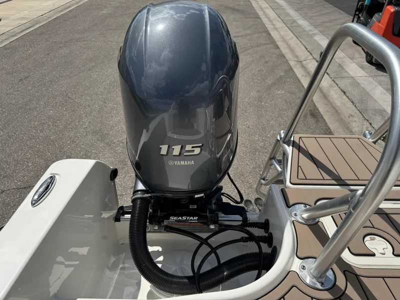 Slide: The Image of 2022 World Cat 230 SD boat with Yamaha 115 outboard motor. - 49