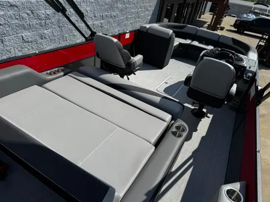 Slide: The Image of 2025 South Bay S224UL pontoon boat interior with gray seating and modern design. - 6