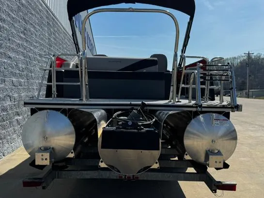 Slide: The Image of 2025 South Bay S224UL pontoon boat, rear view, parked on trailer, sunny day. - 8
