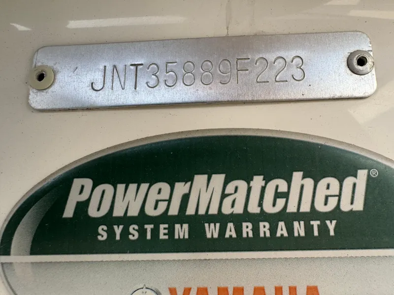 Slide: The Image of 2023 NauticStar 191 Hybrid boat with PowerMatched System Warranty label and serial number plate. - 11