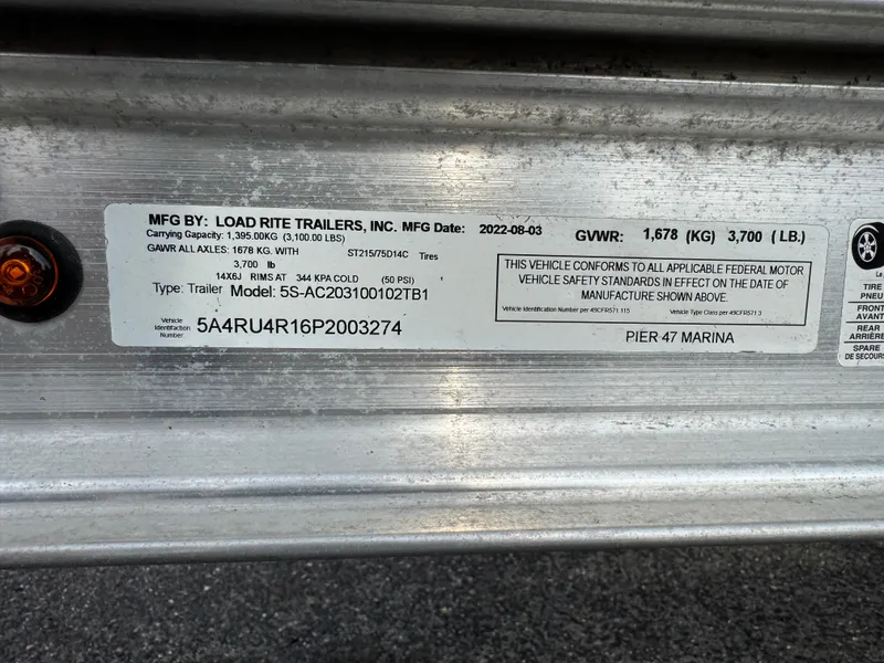 Slide: The Image of Label on Load Rite trailer, model SS-AC203100102TB1, manufactured in 2022, at Pier 47 Marina. - 13